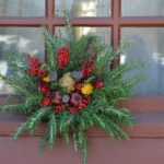 "Christmas (Window) Wreath" by Tobyotter is licensed under CC BY 2.0